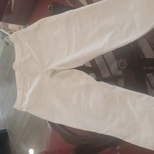Woman's white Spanx jeans